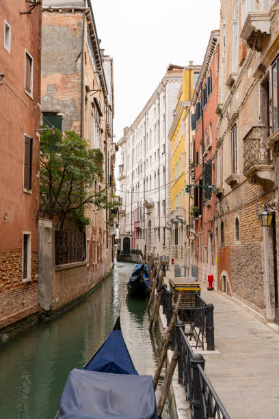 istock Venice canal between colorful facades and with gondolas 1477535861