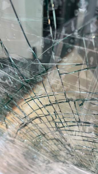 istock Masses of cracked and broken glass 1477536196