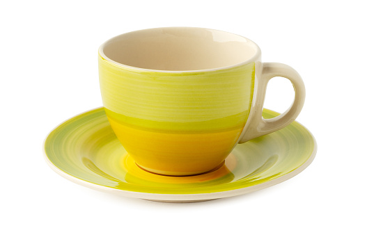 Ceramic cup and saucer isolated on white background