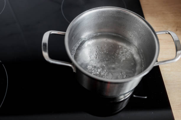 istock Pot of Boiling Water with Steam 1477552743