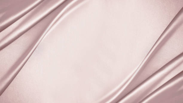 Pink rose biege silk satin. Draped fabric. Light pale brown luxury background. Flat lay, table top view. Pink rose biege silk satin. Draped fabric. Light pale brown luxury elegant background with space for design. Flat lay, table top view. Template. Soft folds. Wedding, birthday. dark pink dress stock pictures, royalty-free photos & images