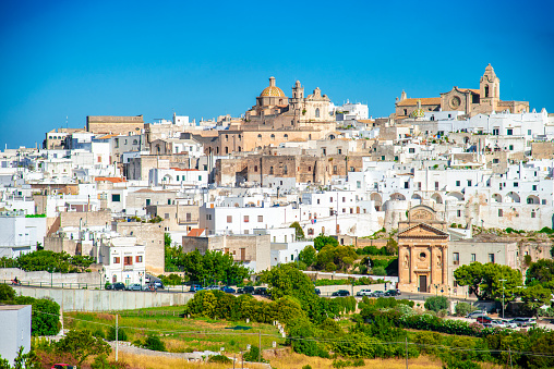 Ostuni is a city and comune, located about 8 km from the coast, in the province of Brindisi, region of Apulia, Italy. The town has a population of about 32,000 during the winter, but can swell to 100,000 inhabitants during summer, being among the main towns attracting tourists in Apulia.