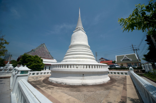 Ancient white pagoda in Thai temple at Samutprakran Province in Middle of Thailand .