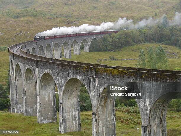 Train Jacobite On Glenfinnan Viaduct Stock Photo - Download Image Now - Scotland, Train - Vehicle, Arch - Architectural Feature