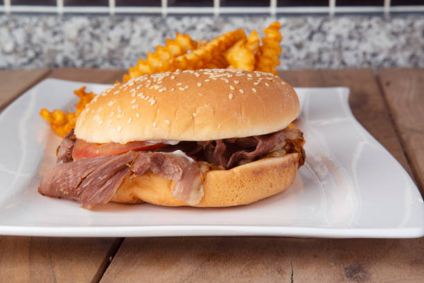 istock Grilled Meat Turkish Doner kebab and fried potatoes 1477558717