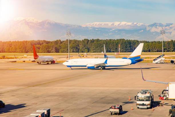istock unbranded planes parked at the airport. 1477563325