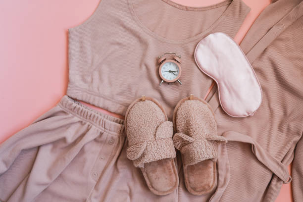 istock Flat lay composition with house slippers, sleeping mask and pajamas on light background 1477568942