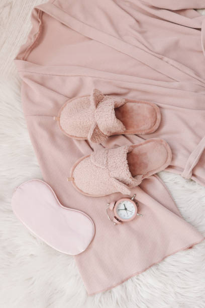 istock Flat lay composition with house slippers, sleeping mask and pajamas on light background 1477568943