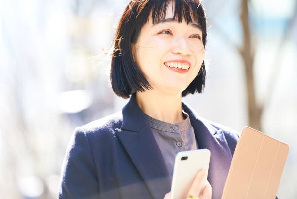istock A young smiling woman portrait 1477569540