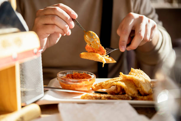Traveler having breakfast in restaurant