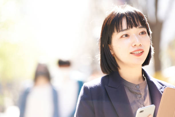 istock A young smiling woman portrait 1477570681
