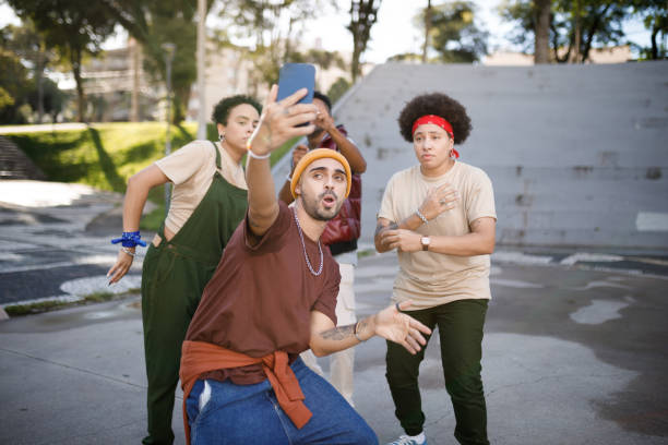 istock Man taking a selfie with his friends 1477574796