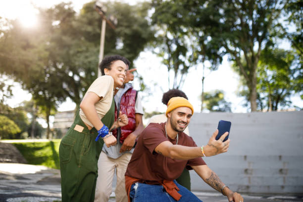 istock Man recording himself and his crew with a smartphone 1477574807