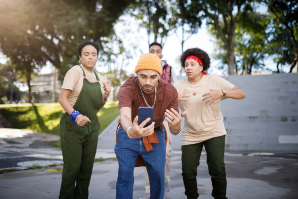 istock Man recording himself and his crew with a smartphone 1477574810