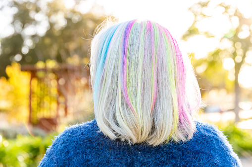 Rear view of woman with rainbow hair