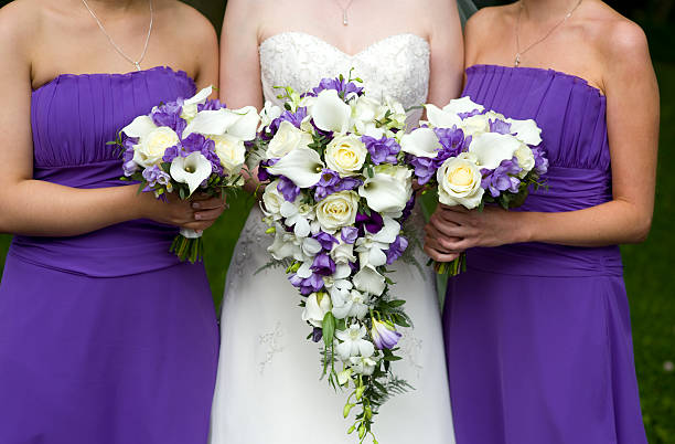 istock bride and bridesmaids with wedding bouquets 147757602