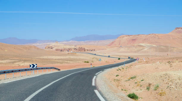 istock Desert road with Atlas Mountains, Morocco 1477576179