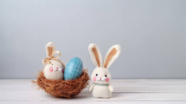 istock Happy Easter Day background and backdrop, cute bunny rabbit, ornament, and colorful egg, copy space greeting and backdrop, banner, rustic vintage design material. Celebrate Easter. 1477581912
