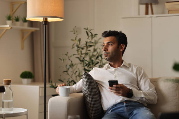 istock Shot of a man using his smartphone 1477585521