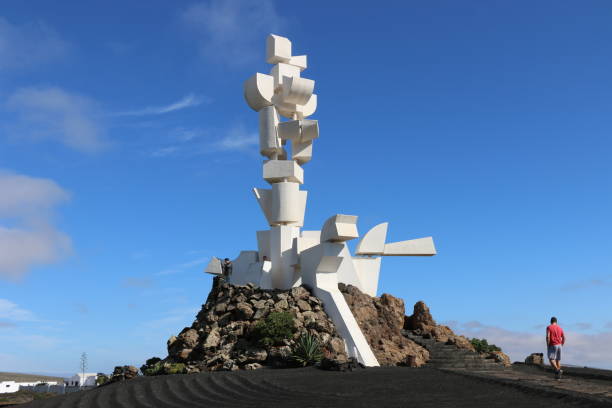 Lanzarote, Canary Island, January 5th, 2018. A man walking towards the Monumento al Campesino (or Monumento a la Fecundidad), designed by César Manrique and  built by Jesús Soto nel 1968,  which stands near the city of San Bartolomé and represent the geographical centre of the island.