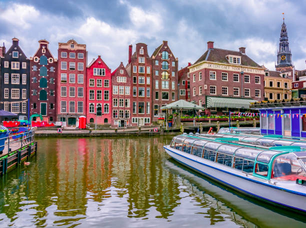 istock Amsterdam architecture along Damrak canal, Netherlands 1477593358