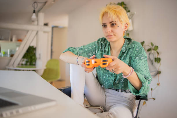 istock Female gamer playing esports 1477597628
