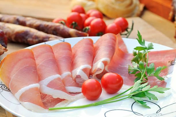 istock Prosciutto with parsley and tomatoes 147759767