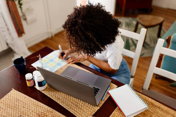 istock Female nutritionist working from home office 1477598915