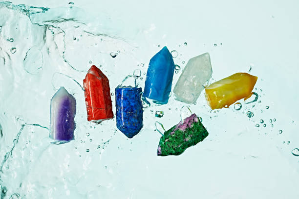 istock Crystal, rock with water splash from topview, Chakra set 1477604844
