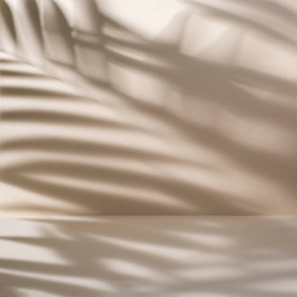 istock Beige abstract background with palm leaves shadow 1477609105
