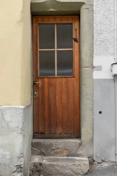 a vintage-style wooden door on a house.
