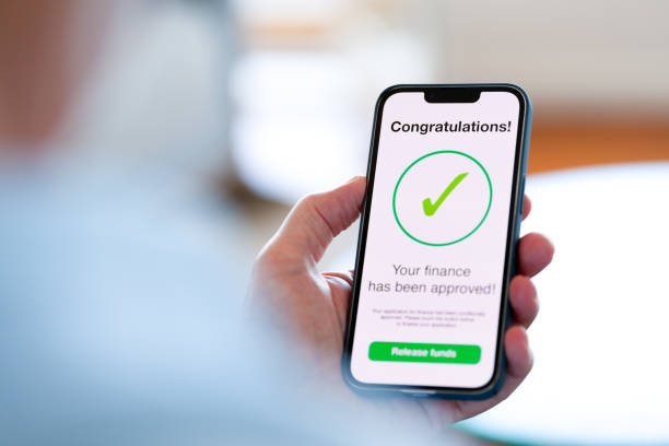 istock Man looking at a loan finance application approval 1477620802