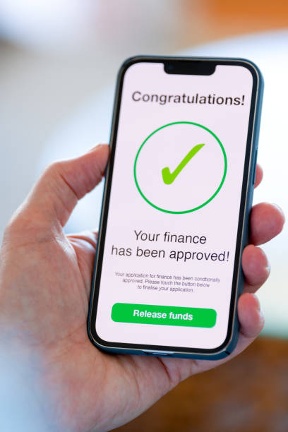 istock Man looking at a loan finance application approval 1477620849