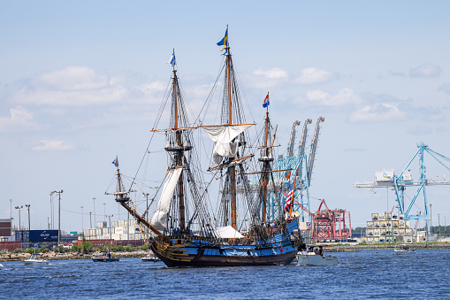 Norfolk, Virginia, USA - June 10, 2022:  The sailing ship Kalmar Nyckel heads up the Elizabeth River as part of the Norfolk Parade of Sail.