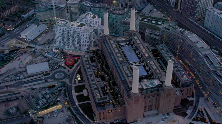 Aerial View of the development at Battersea Power Station and the River Thames, London, UK. 4K