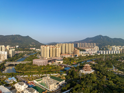 Riverside buildings and park greening in livable city