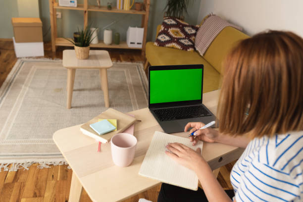 istock Woman working online from her home office 1477640524