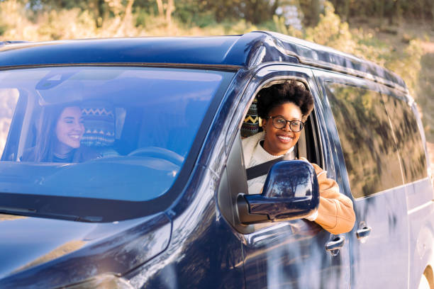 istock Joyful women on a road trip adventure in van 1477641411