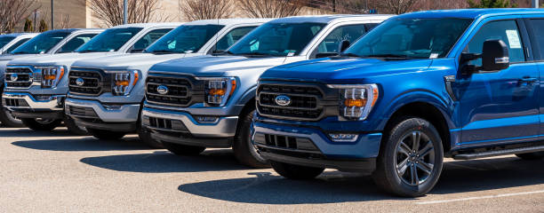 Ford F150 pickup trucks at a dealership stock photo