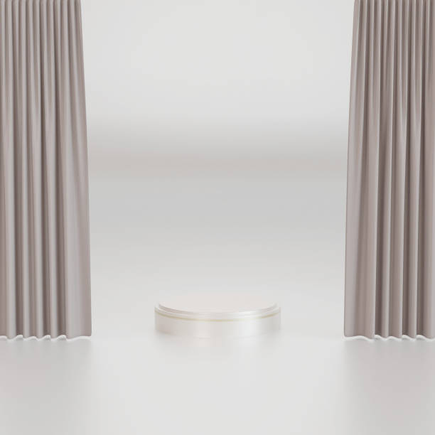 istock silver cylinder pedestal podium and gray curtains.  product display presentation. 3d rendering 1477644695