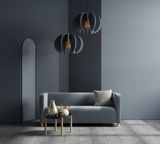 istock Mockup living room interior with blue sofa on empty dark blue wall background.3d rendering 1477649213