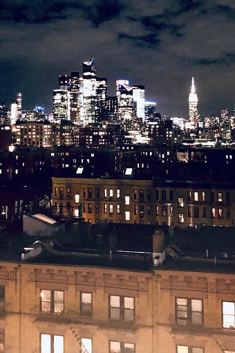 A night view of the west side of Manhattan across the Hudson River from the 10th floor stairwell of a Hoboken, New Jersey apartment building.