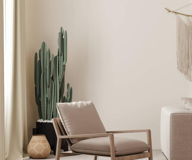 istock Empty beige wall mock up in country, boho style interior background with armchair, cactus and macrame, 3d render 1477651567