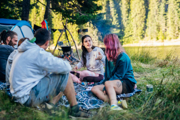 istock Friends having fun on camping vacation. 1477652662