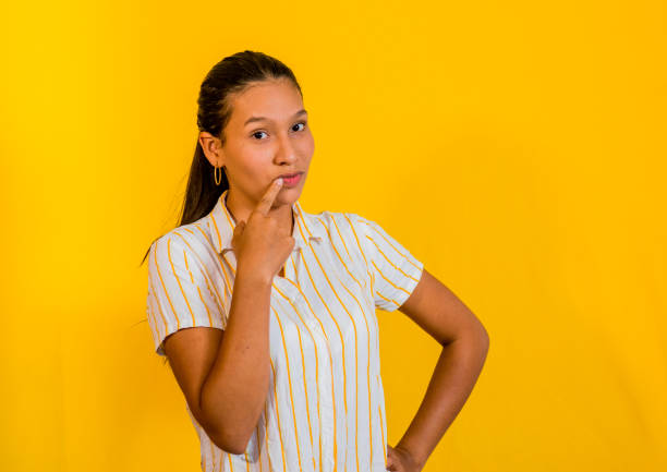 istock latin woman in photo studio 1477653114