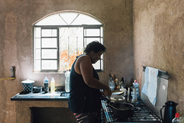 istock Housewife preparing food 1477654810
