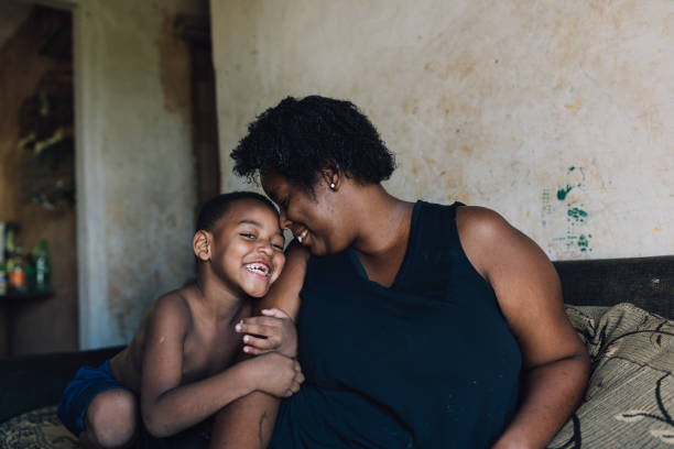 istock Mother and son having fun at home 1477654917