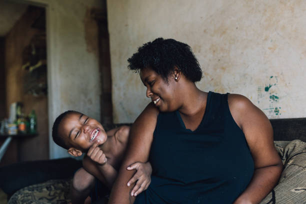istock Mother and son having fun at home 1477654947