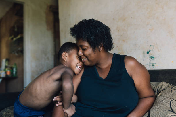 istock Mother and son having fun at home 1477654998