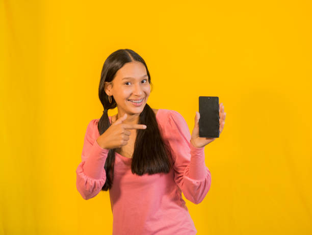 istock latin woman in photo studio 1477656157
